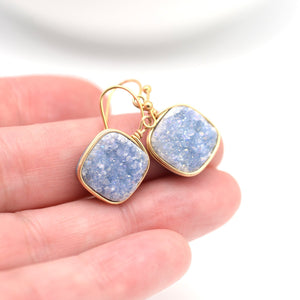 Slate blue druzy earrings in hand