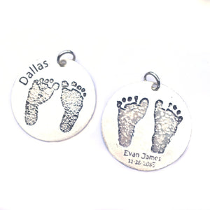 Etched foot print pendants closeup