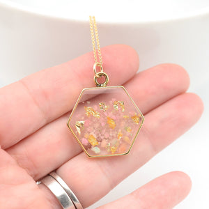 hexagon necklace in hand