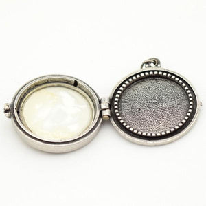 Inside silver floral locket