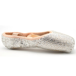 pointe shoes covered in Swarovski crystals