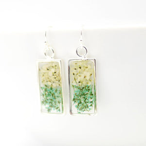 green and white flower earrings