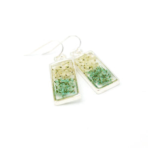 geometric earrings with flowers