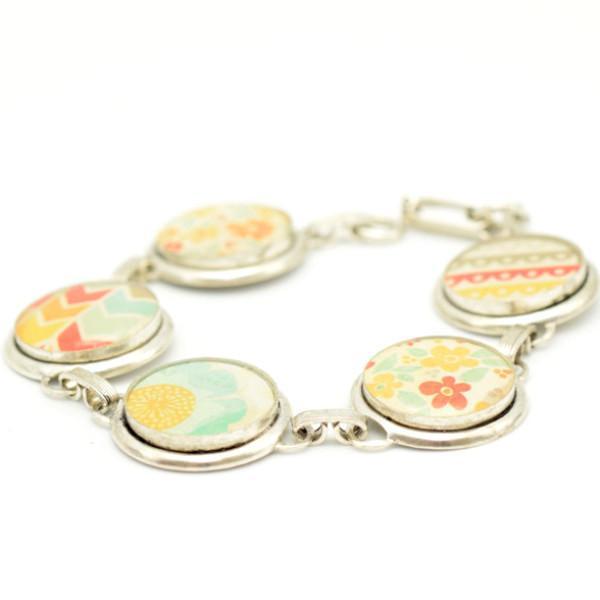 Floral whimsey silver link bracelet