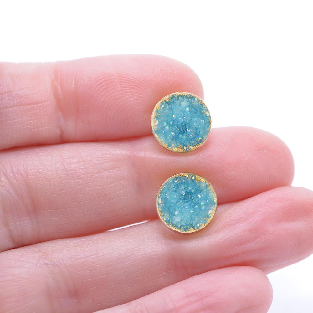 Aqua druzy post earrings in hand
