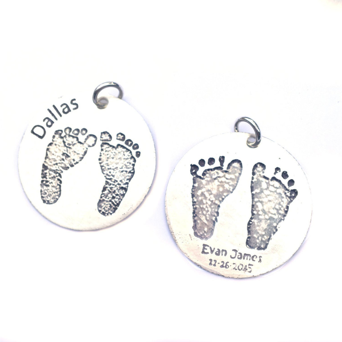 Etched foot print pendants closeup