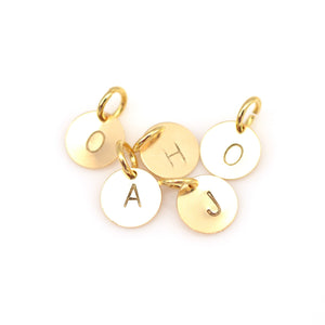 Gold stamped charm