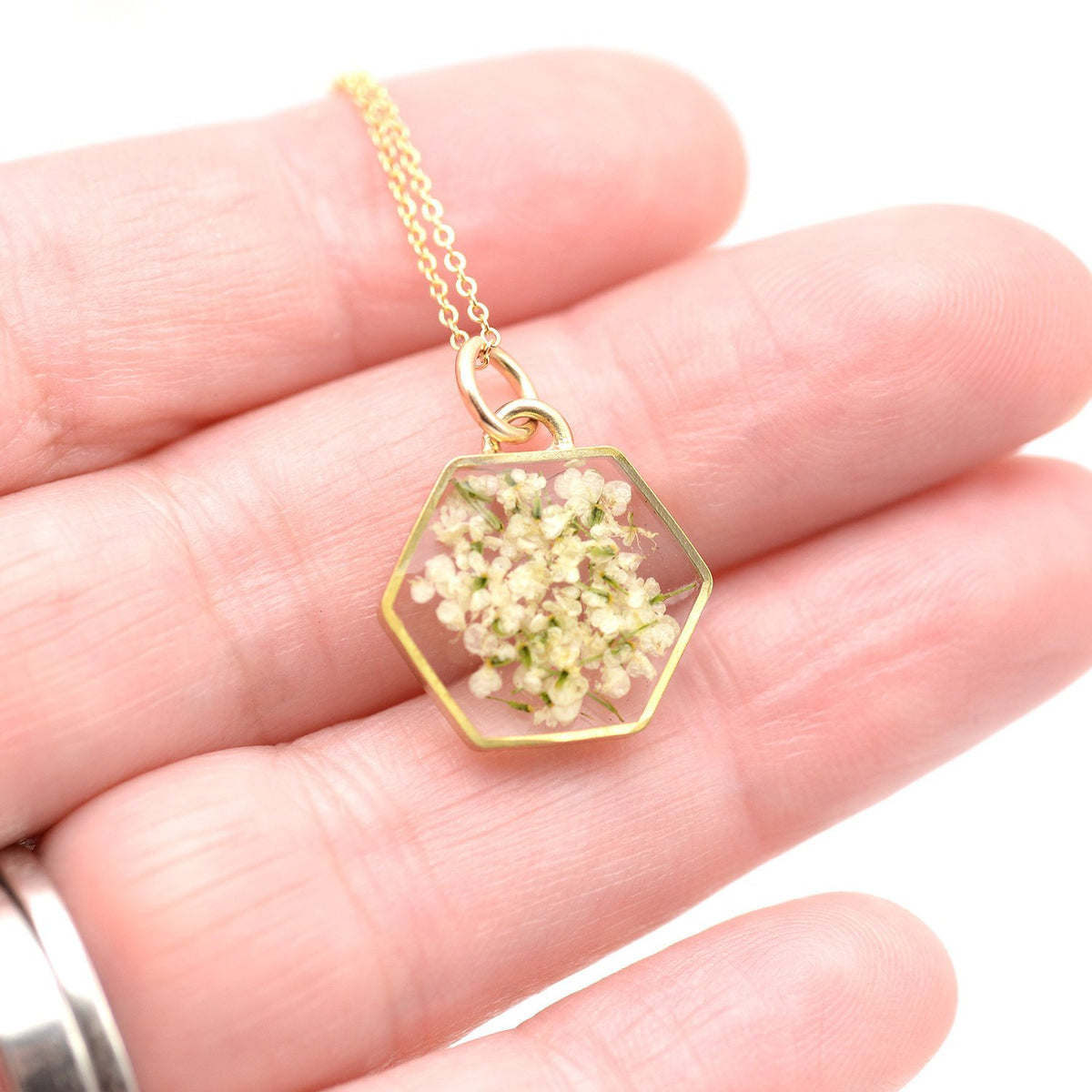 Large floral hexagon necklace in gold